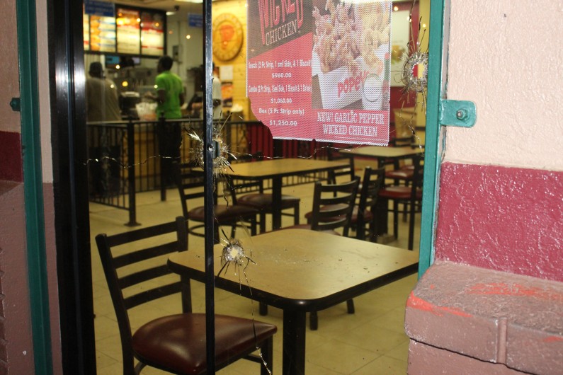 Gunmen and policeman clash during robbery attempt at Popeyes