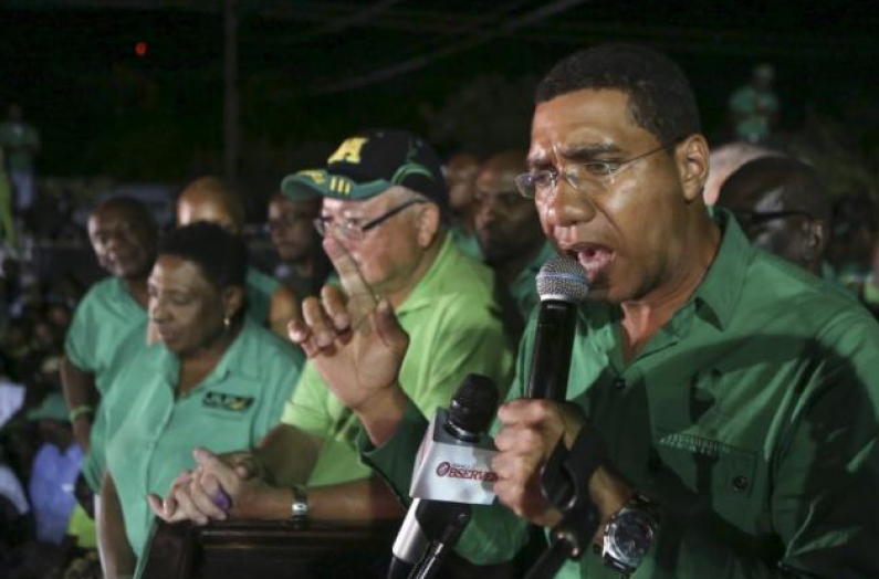 Jamaicans vote JLP back in to Government in camera finish elections