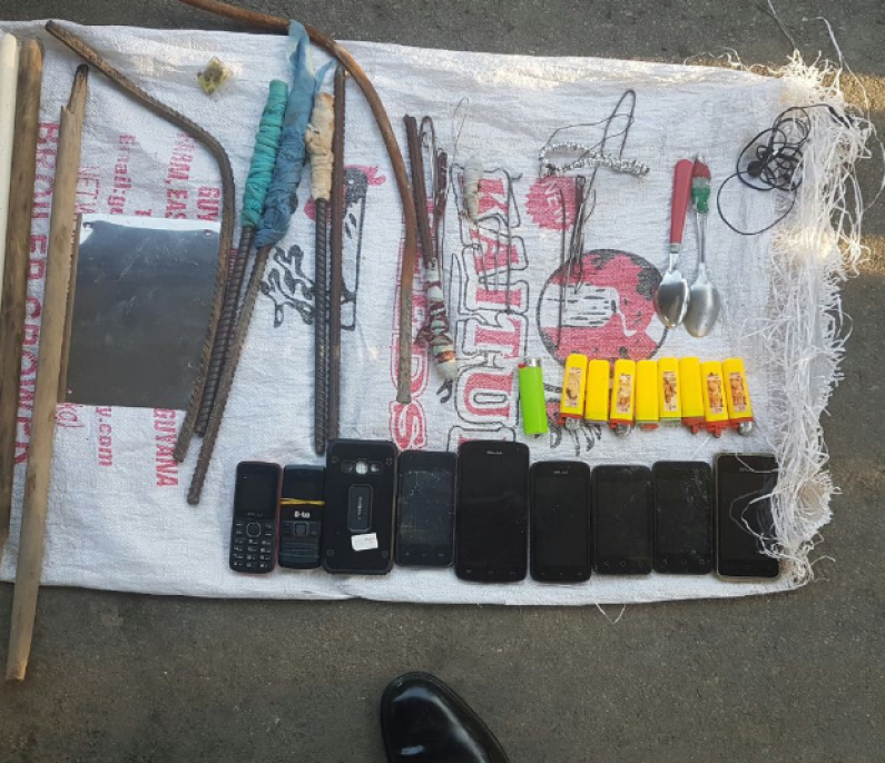 Improvised weapons, phones and pepper sauce confiscated during raids at prisons