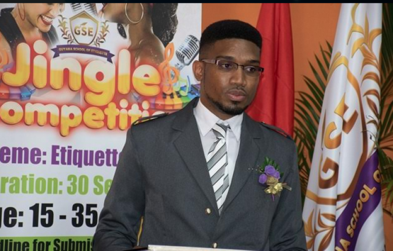 Recently deported Trini fraudster “returns” and opens etiquette school in Guyana