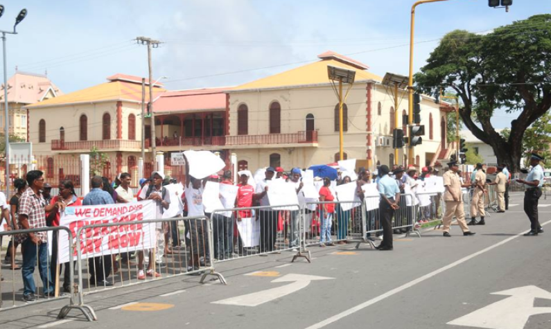 Sugar workers protest outside Parliament over severance and salaries