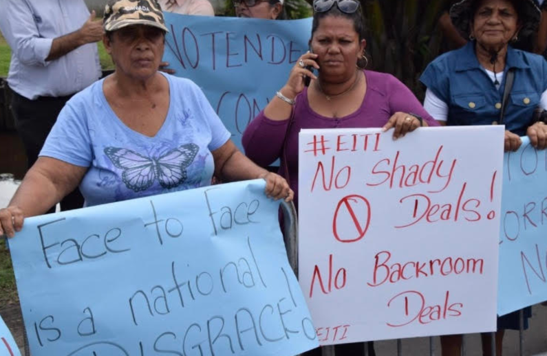 Group of protesters demand transparency in Guyana’s sale of first oil