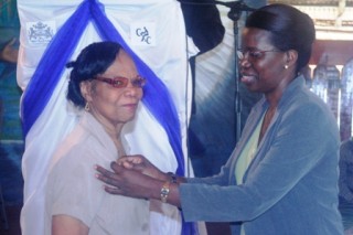 Ms. Juliet Persico being awarded as the longest serving local Registrar.