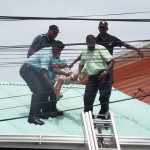 Police arrest alleged sodomy victim after roof top protest