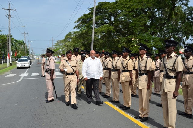President Donald Ramotar inspecting ranks just before the opening of the Annual Police Officers Conference