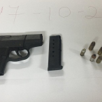 Four arrested after found with unlicensed gun in car