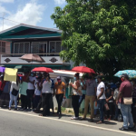 Large crowd protests in support of suspects in alleged ponzi scheme