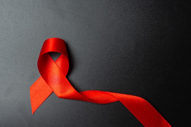 red-ribbon-hiv-awareness-concept-world-aids-day-world-sexual-health-day_1150-24386