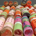 Guyanese man busted with birds in hair curlers at JFK; Fined and sent back to Guyana