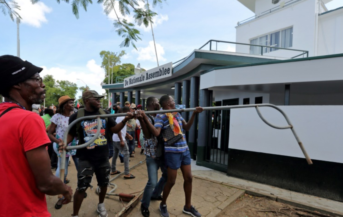 Protesters storm Surinamese Parliament and loot businesses over fuel and electricity prices – News Source Guyana