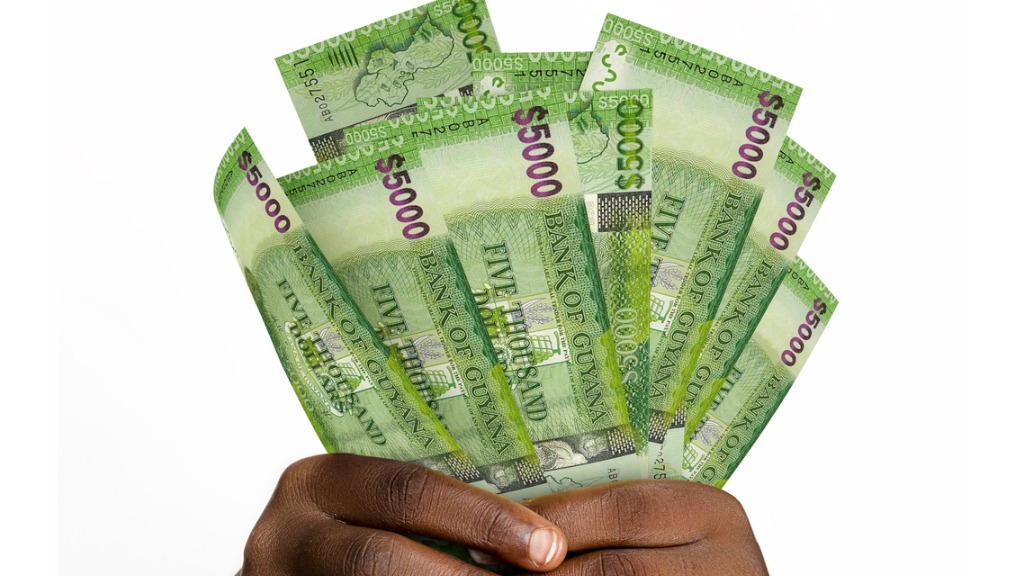 black-hands-holding-3d-rendered-5000-guyanese-dollar-notes-closeup-of-hands-holding-guyanese.jpg_s1024x1024wisk20cyt591rylps1yw2hrnlvmnmginorfnc_xptliugsum00_15120a50e766bccd886f4399611185a7